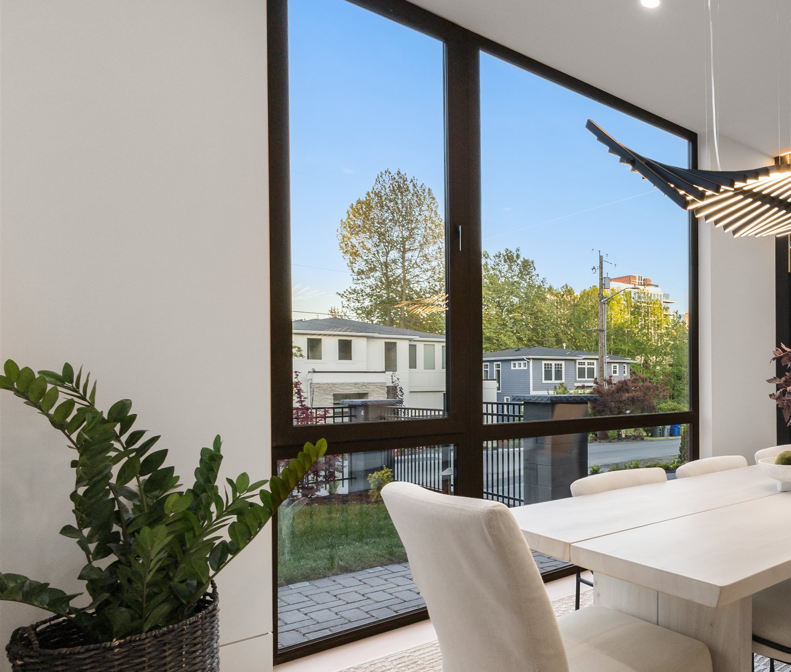 Dining room with black-framed corner glass